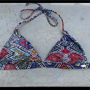 Reversible swim top